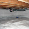 A heating duct extends along this sealed crawl space in Waukesha.