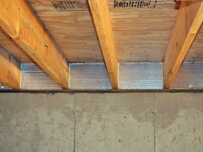 Crawl E Insulation With Silverglo In Wisconsin And Illinois Silverglo Insulation Installed In A Floor Joist Buffalo Grove