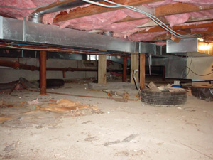Ductwork in crawl space in Racine Falling insulation and uninsulated ducts in crawl space