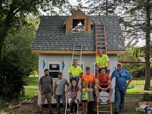 Buck Buckley's TBF Employees Volunteer To Build Fort for Local Pastor's Fam...