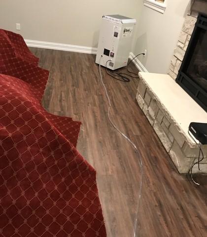 Here you can see our SaniDry Basement Dehumidifier. The SaniDry has an air filtration system that removes mold particles and other allergens, while also removing moisture from your basement!