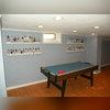 This family wanted an area where they could spend with their children, and we helped them come up with the Rec Room of their dreams! Lots of hours will be spent playing air hockey together!