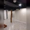 Our team created this spacious "man cave" in West Bend, WI with our moisture and mold-resistant EverLast Vinyl Walls, ThermalDry Flooring in the color of Sandstone Gray, and Painted Ceiling.