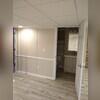 The project will include EverLast Wall Systems, Total Basement Finishing™ drop ceiling tiles, and Recessed Can Lights to create a bright and inviting atmosphere. Durable plank flooring will be installed, with the possibility of integrating a heating system for added comfort. A sleek dry bar...